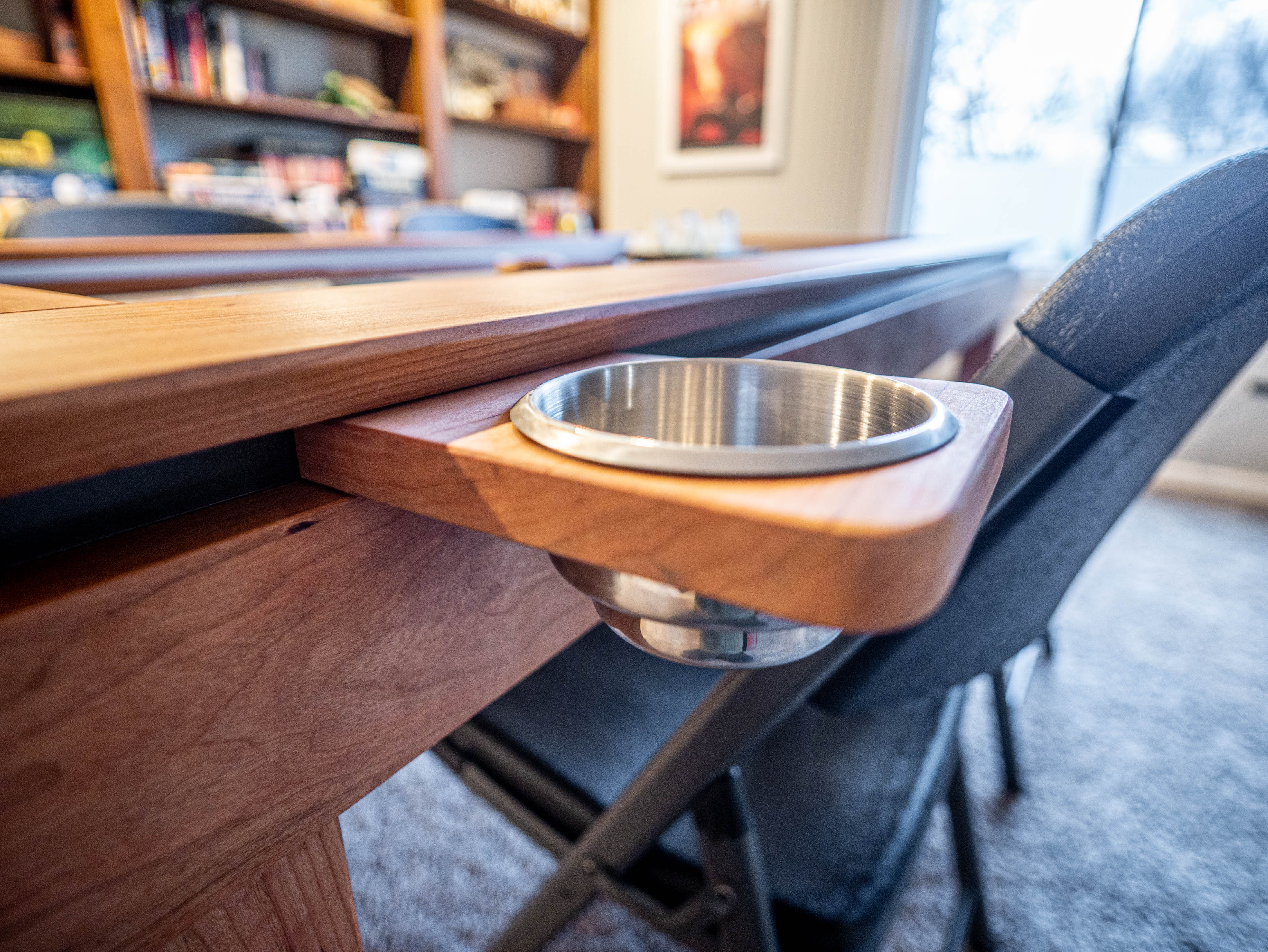 Magnetic wooden cup holder attached to the gaming table