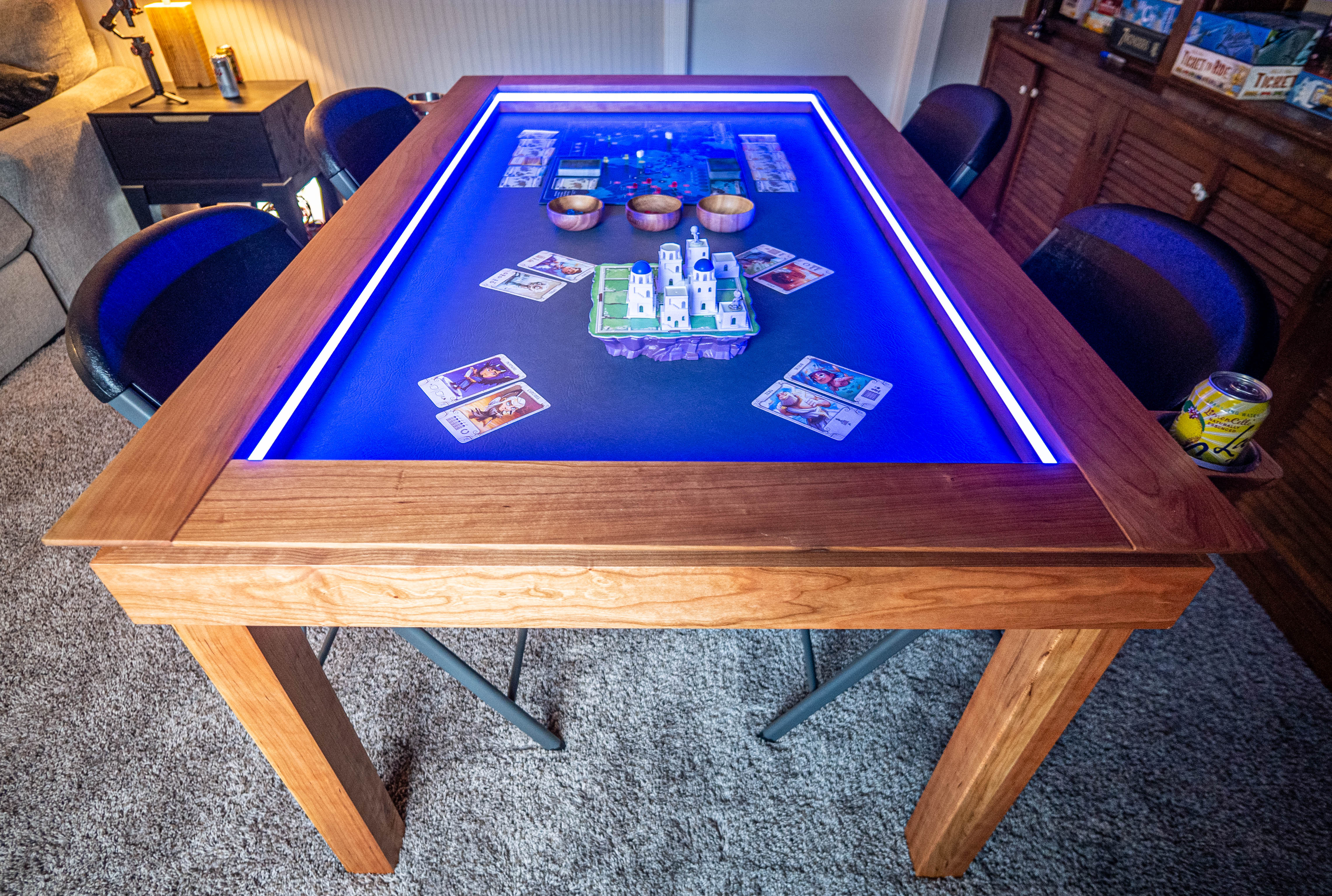 Gaming table illuminated in blue for a board game